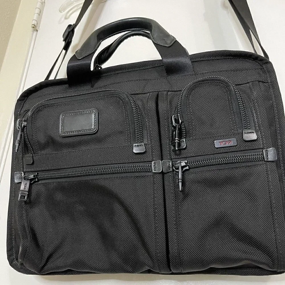 TUMI Alpha Expandable Black Nylon messenger travel laptop carryon bag with strap